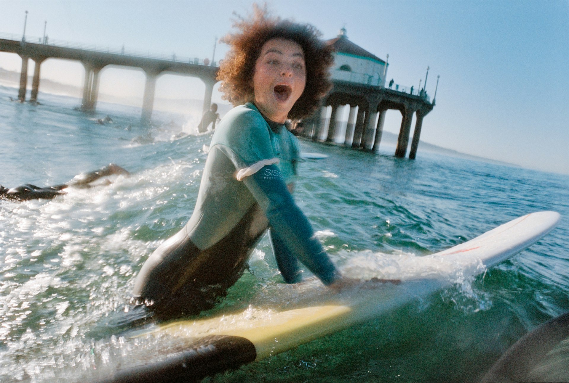 Photos capturing joy and community of Black female and non-binary American surfers