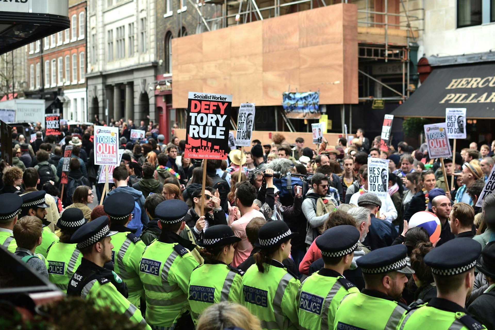 Thousands march through London to demand David Cameron's resignation