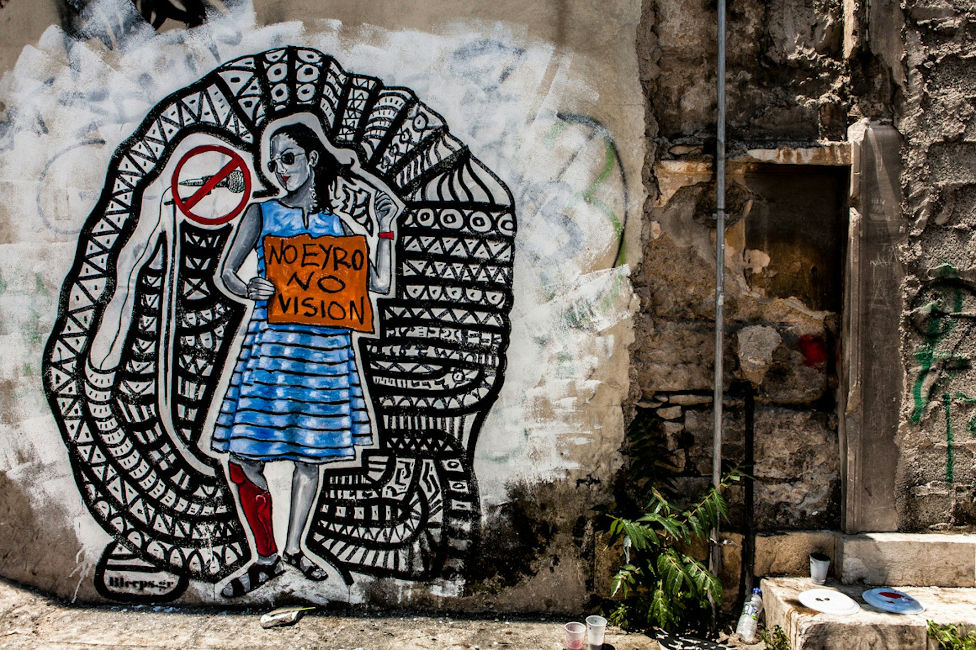 The street artist responding to Greece's social turmoil