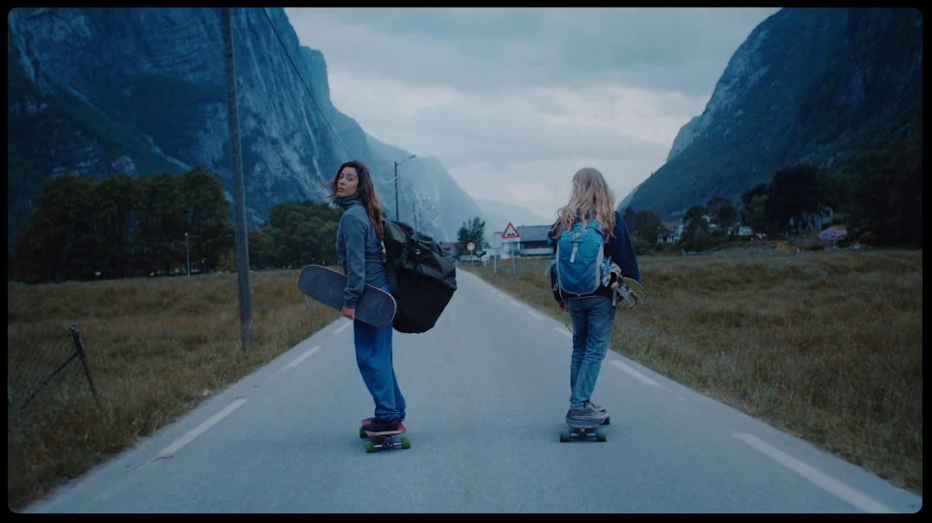 Girls bomb beautiful, crazy-big winding hills in Norway on longboards