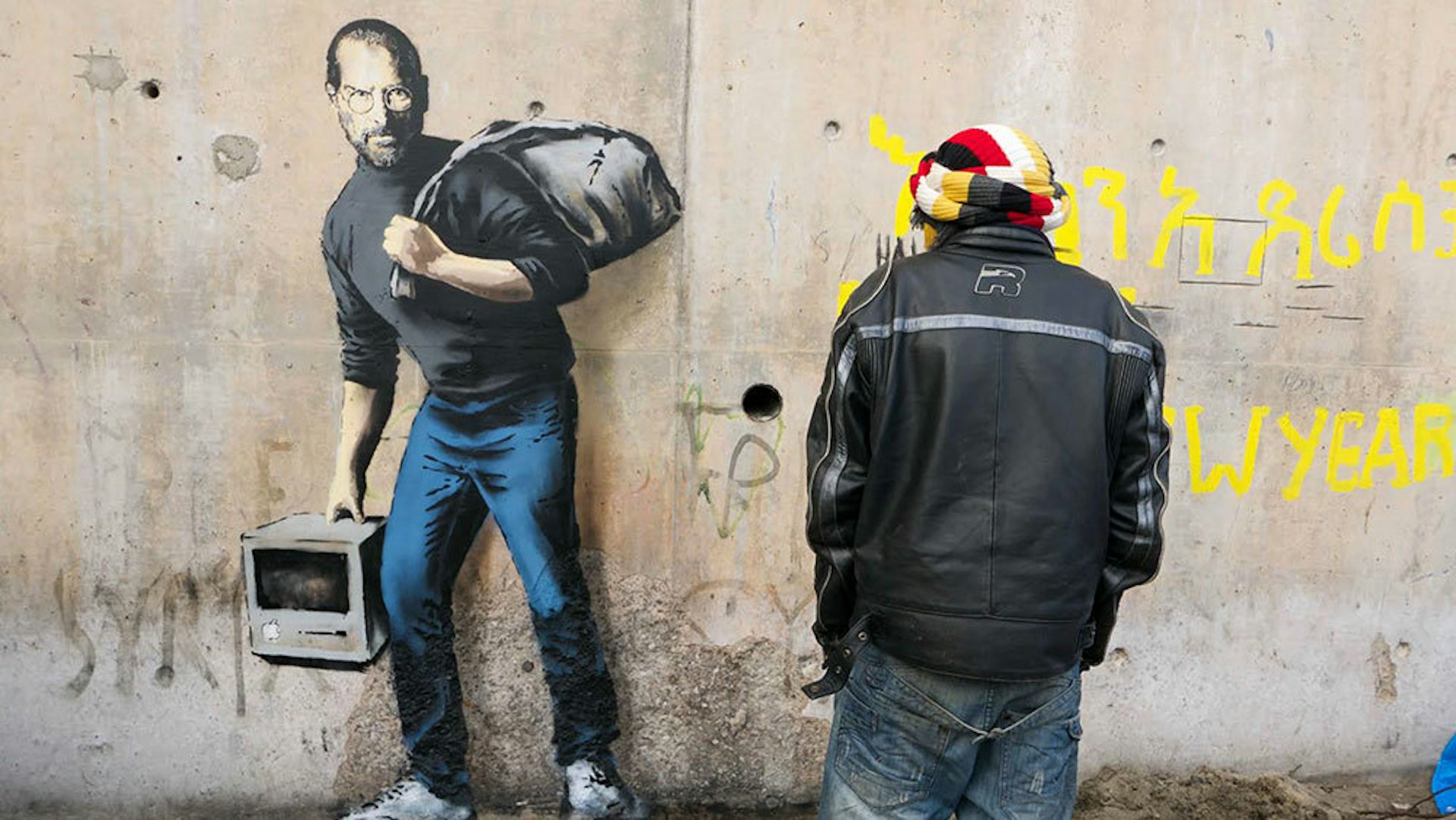 Banksy gives the Syrian refugee crisis a new face: Steve Jobs
