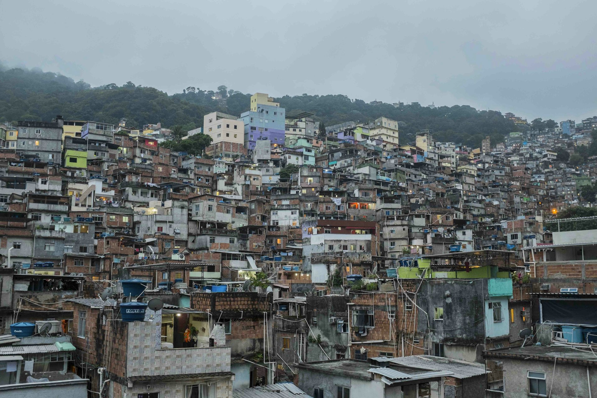 Rochinha favela, Rio de Janeiro. Top of page: Gabriel 'Popó' Oliveira looks out at the lineup at Cantão, São Conrado.