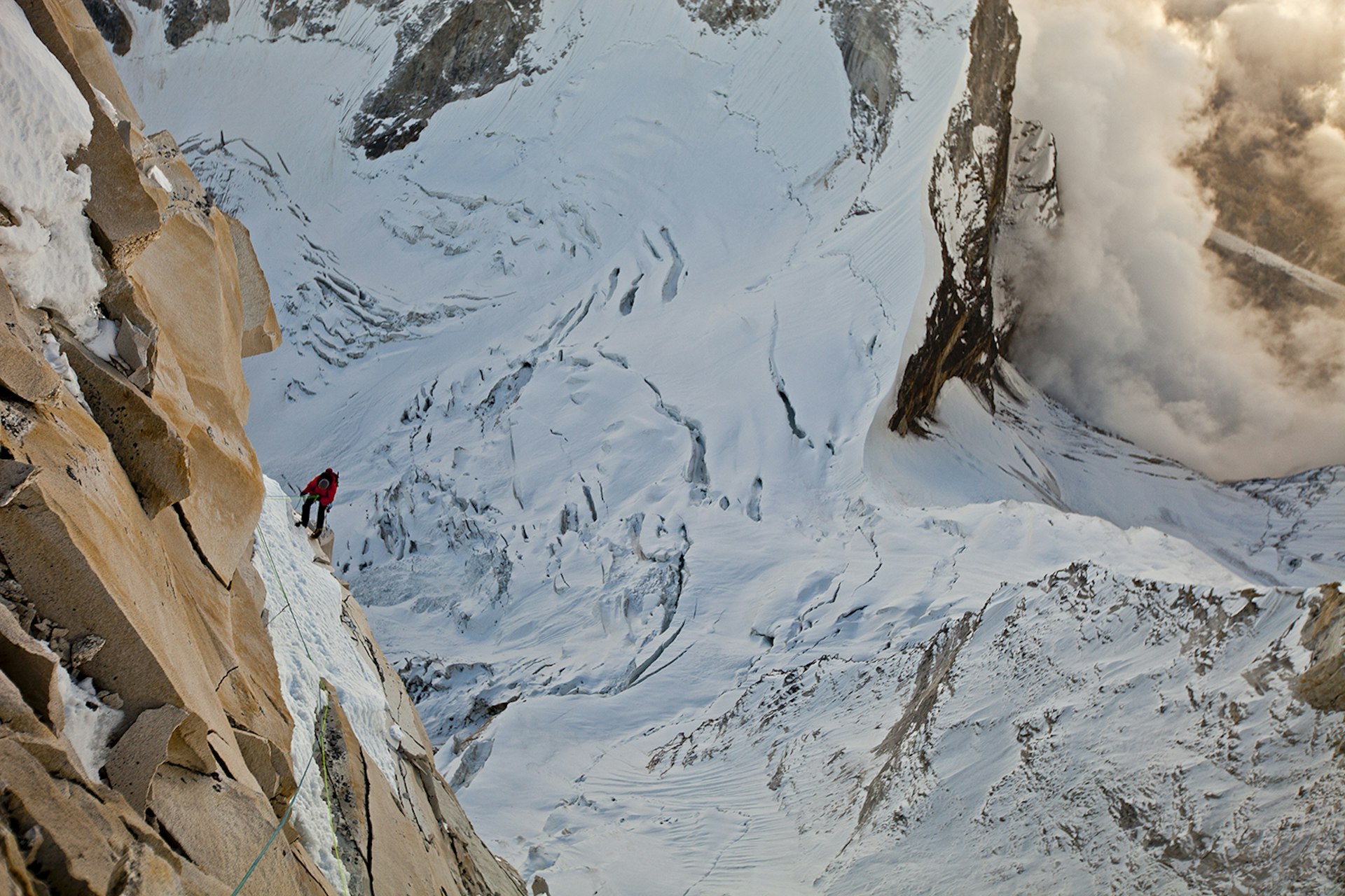 Conrad rappelling from the summit of Meru after 11 days of climbing.