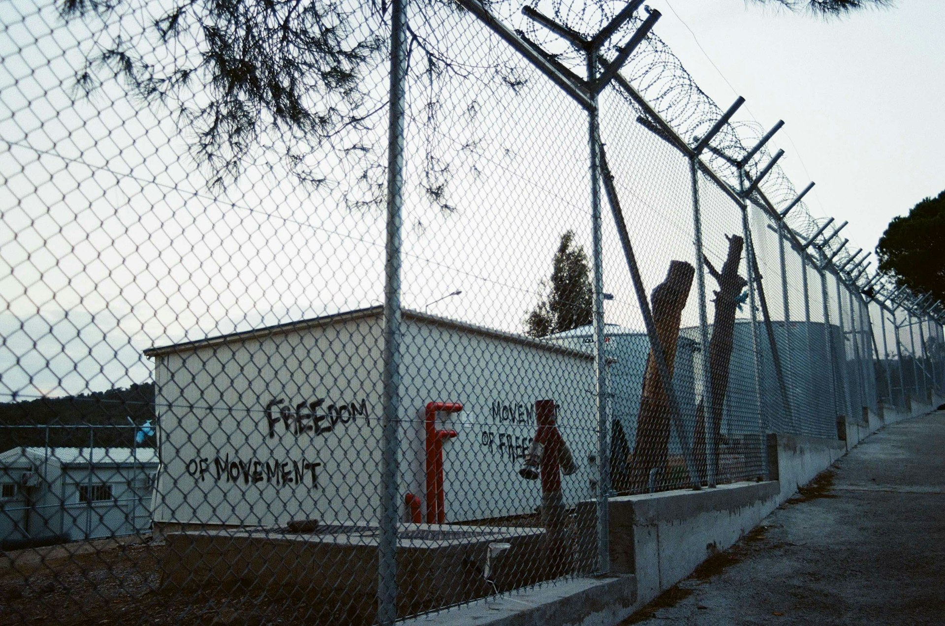 Camp Moria perimiter fence. Photo by Tom Bailey