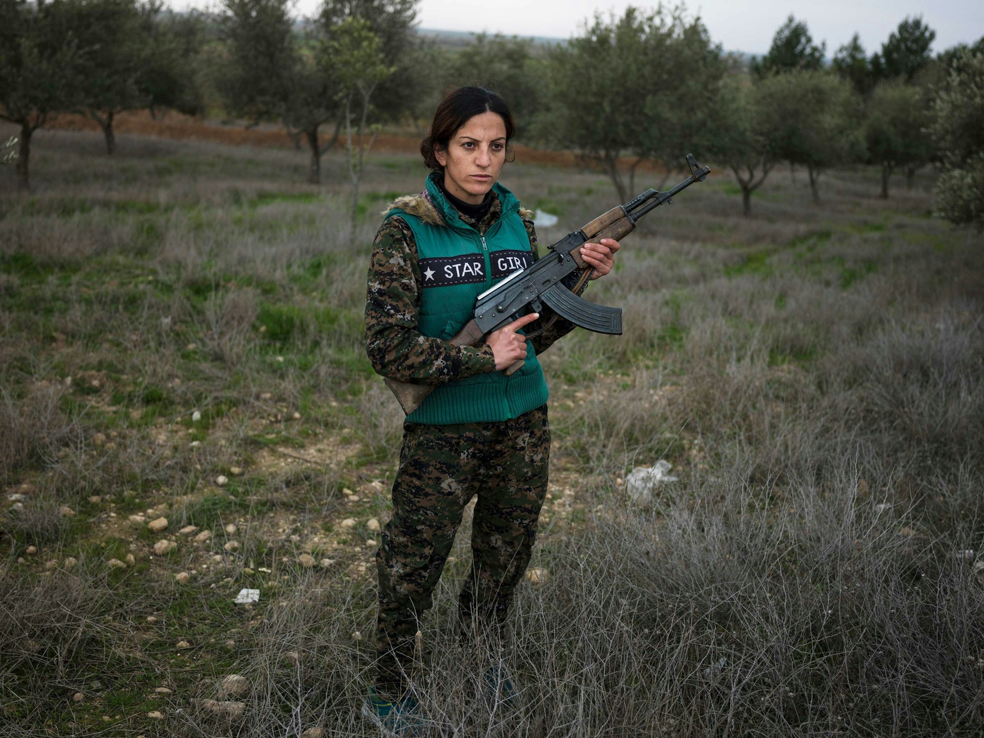 Saria Zilan, eighteen, from Amuda. "I fought with ISIS in Serikani. I captured one of them and wanted to kill him, but my comrades did not let me do so. He kept staring at the ground and would not look at me, because he said it was forbidden by his religion to look at a woman." © Newsha Tavakolian / Magnum Photos