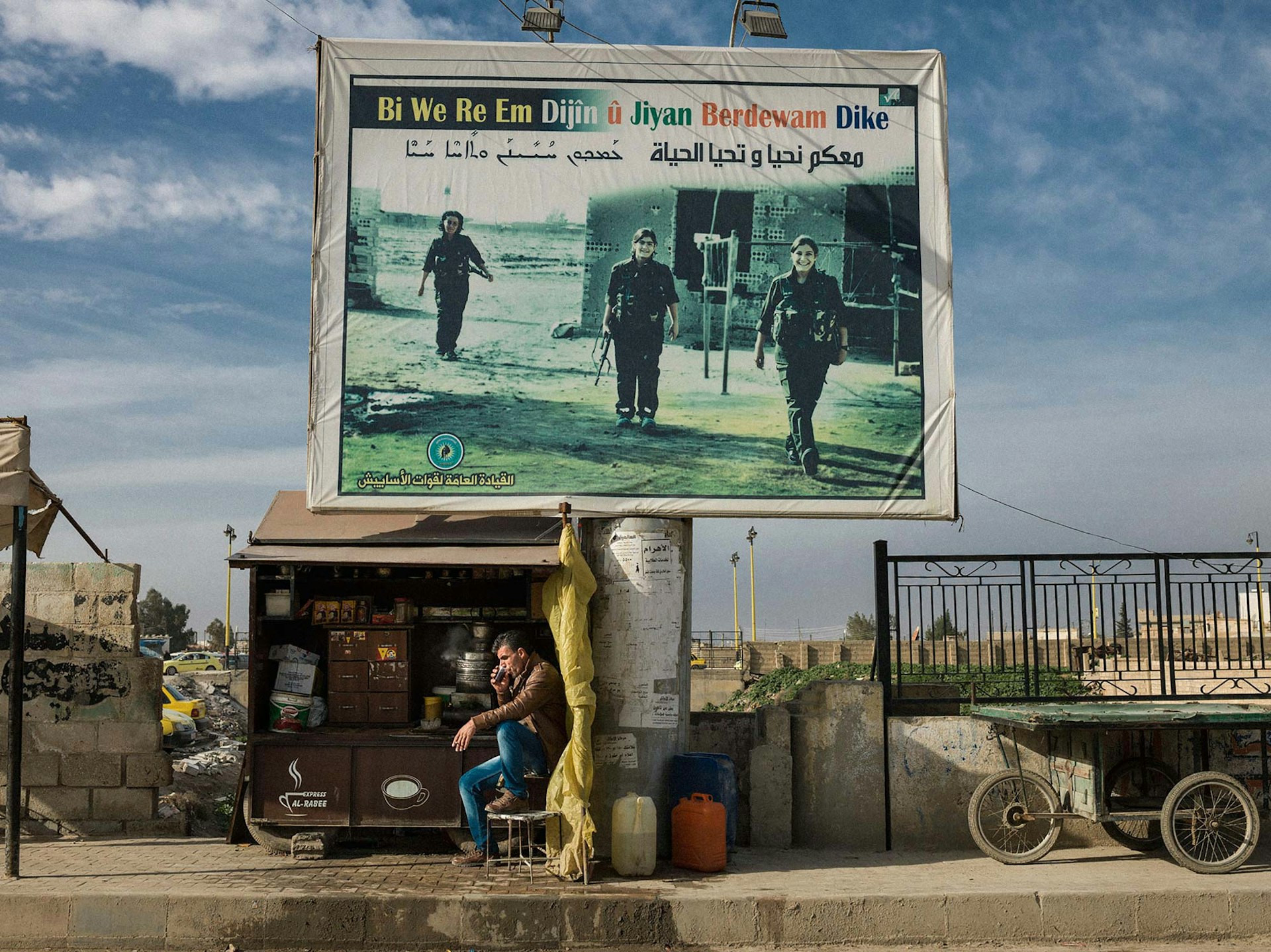 Billboards in Qamishlou. Rojava, of martyrs who died fighting ISIS: "with you we live on and life continues". © Newsha Tavakolian / Magnum Photos