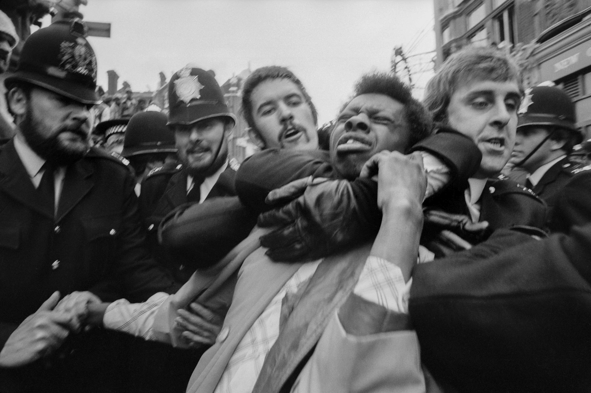GB. ENGLAND. London. Race Riots in Lewisham. Police making an arrest. 1977.