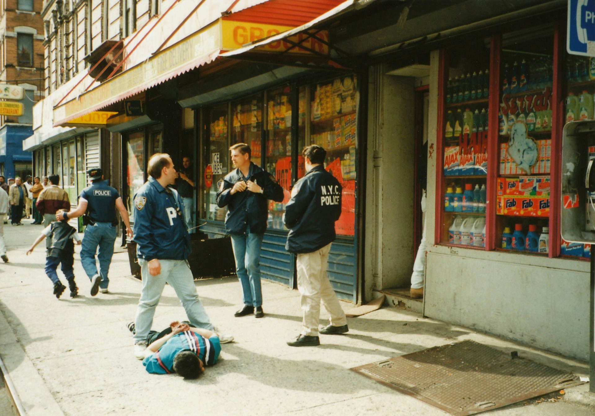 Drug arrest at 179 Essex street in 1995. Typical example of a neighbourhood grocery store whose main source of income was selling hard drugs. The Lower East Side was one of the most economically profitable and open public drug markets in America and probably the world. Drugs were sold openly all over the minority section of the community.