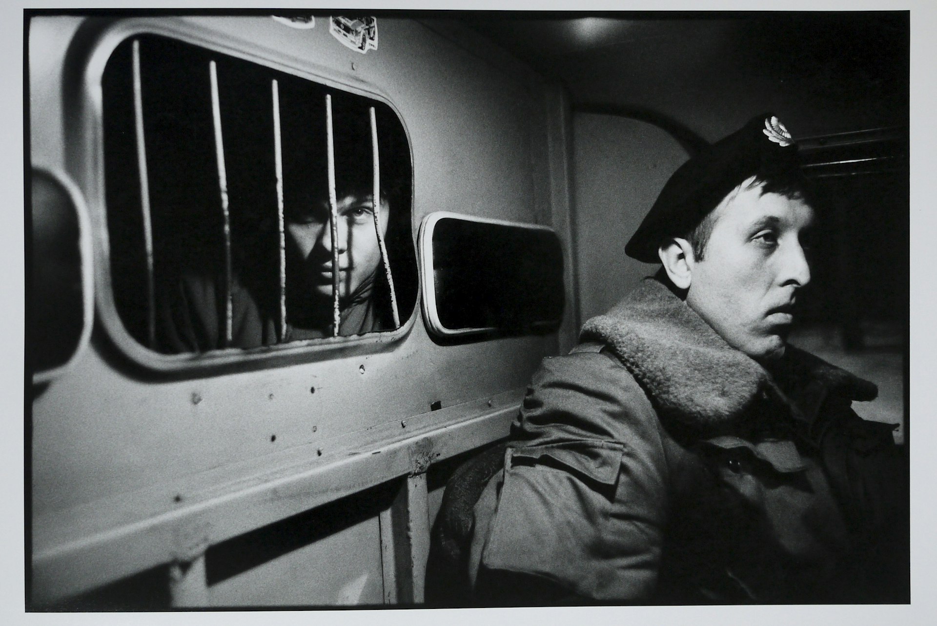 A drunk in the back of a police van, December 1992.