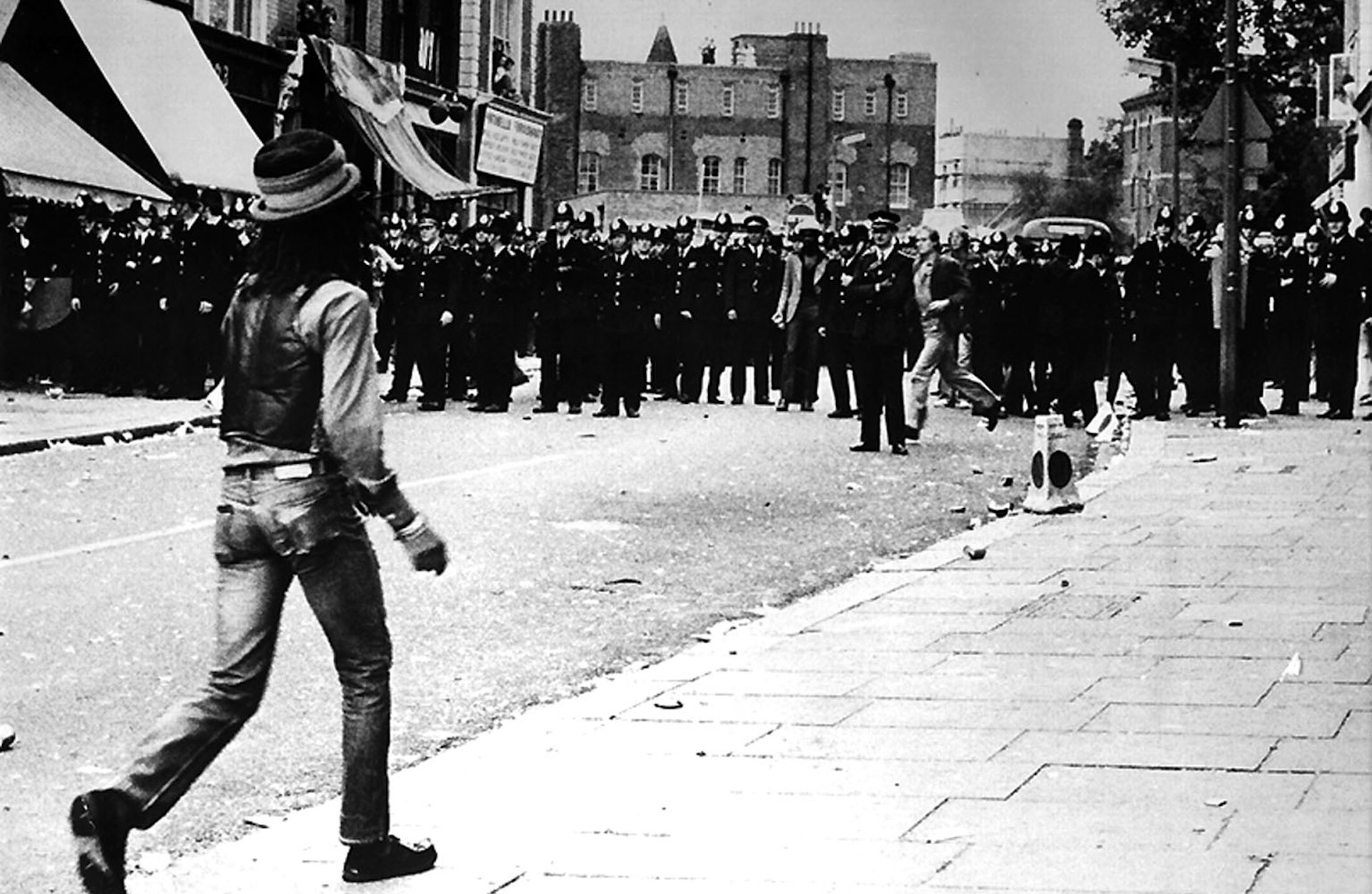 Don Letts at the Notting Hill Carnival riots, 1976. Photo by Rocco Macaulay.