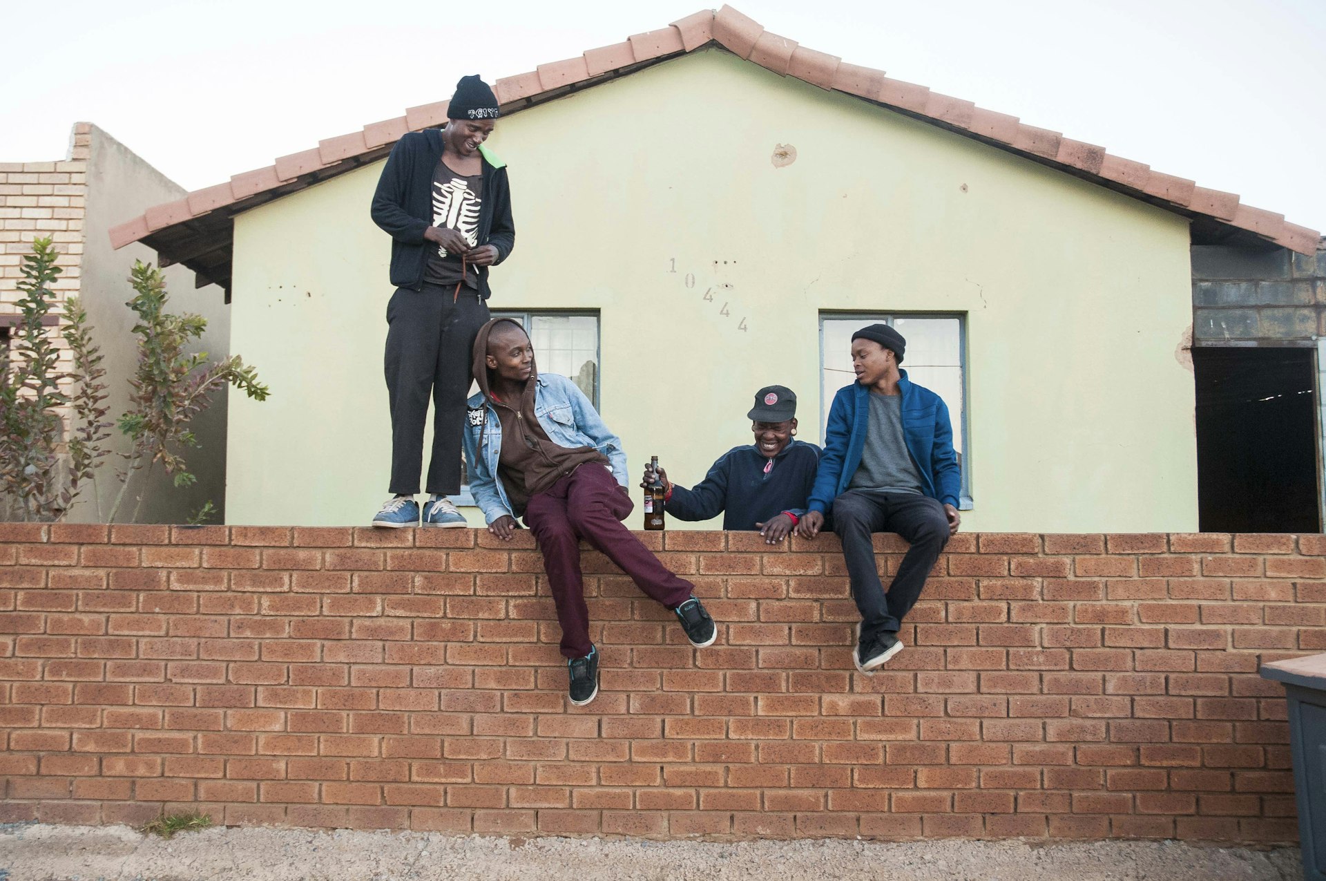 Hanging out at the Dogg Pound, TCIYF's skate house.  Left to right: Thula, guitarist; Pule, lead vocalist;  Jazz, drummer; Toxic, bassist.
