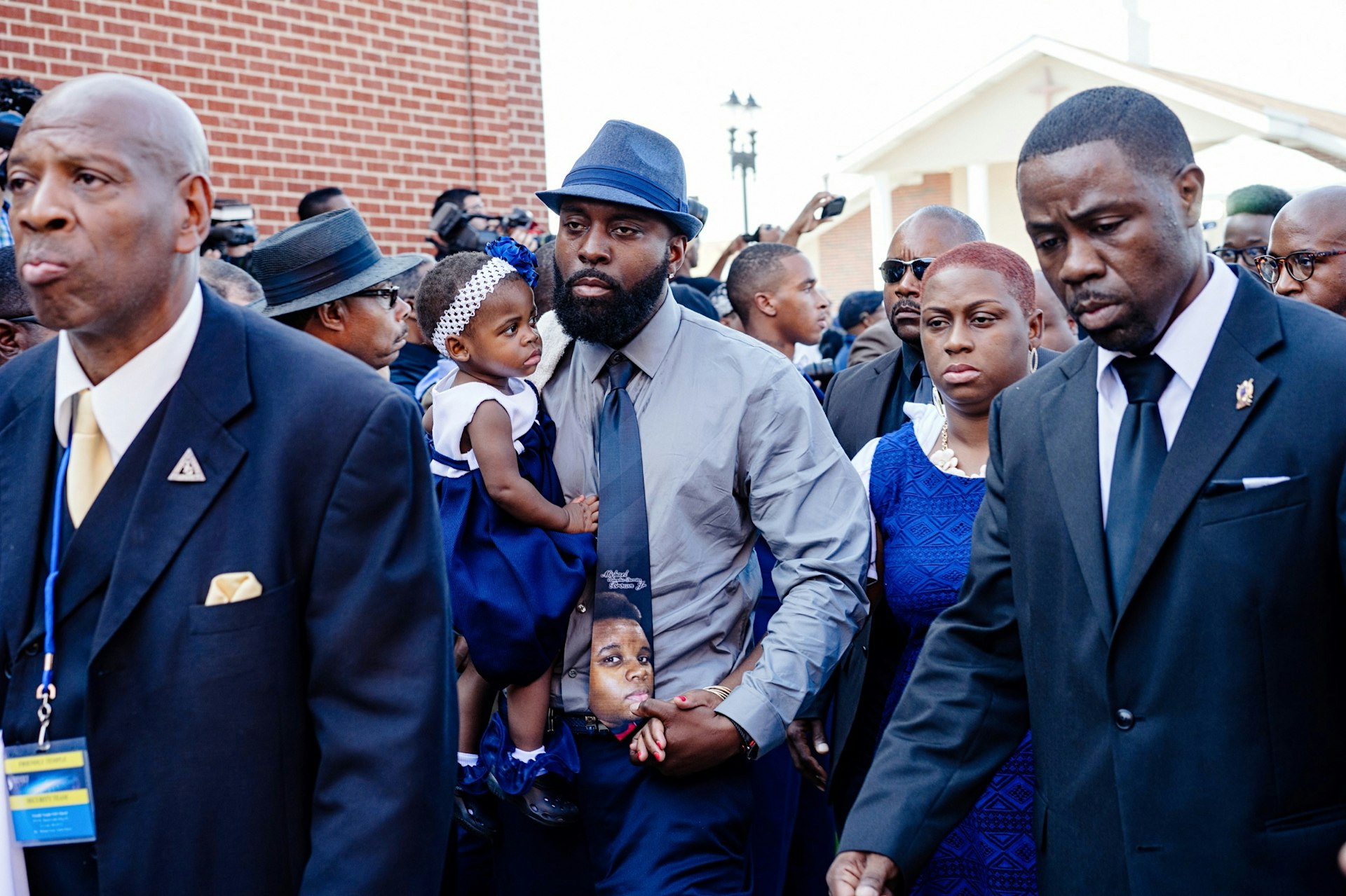 Michael Brown Sr. walks into the Friendly Temple Missionary Baptist Church, St. Louis, Missouri, to attend the funeral service of his son, Michael Brown Jr.