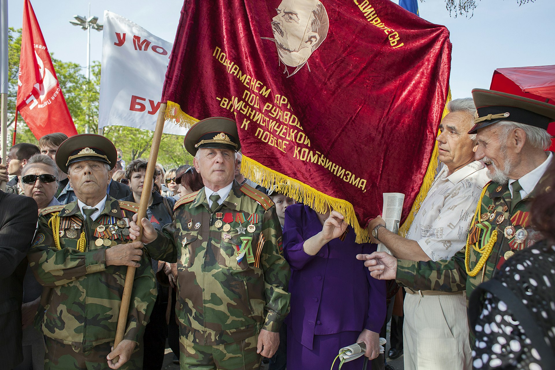 Veterans with soviet flag