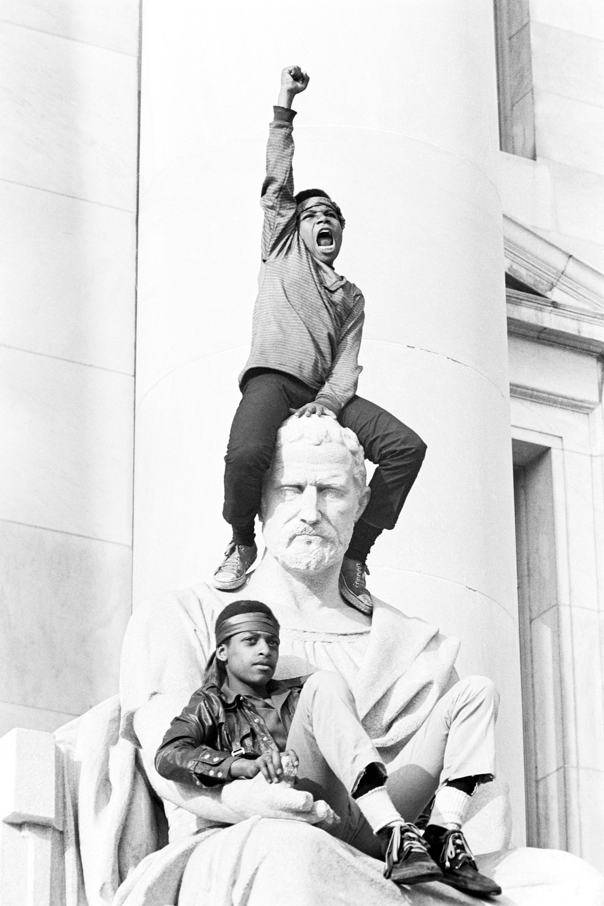 A boy salutes the Panthers, New Haven County Courthouse, May 1, 1970