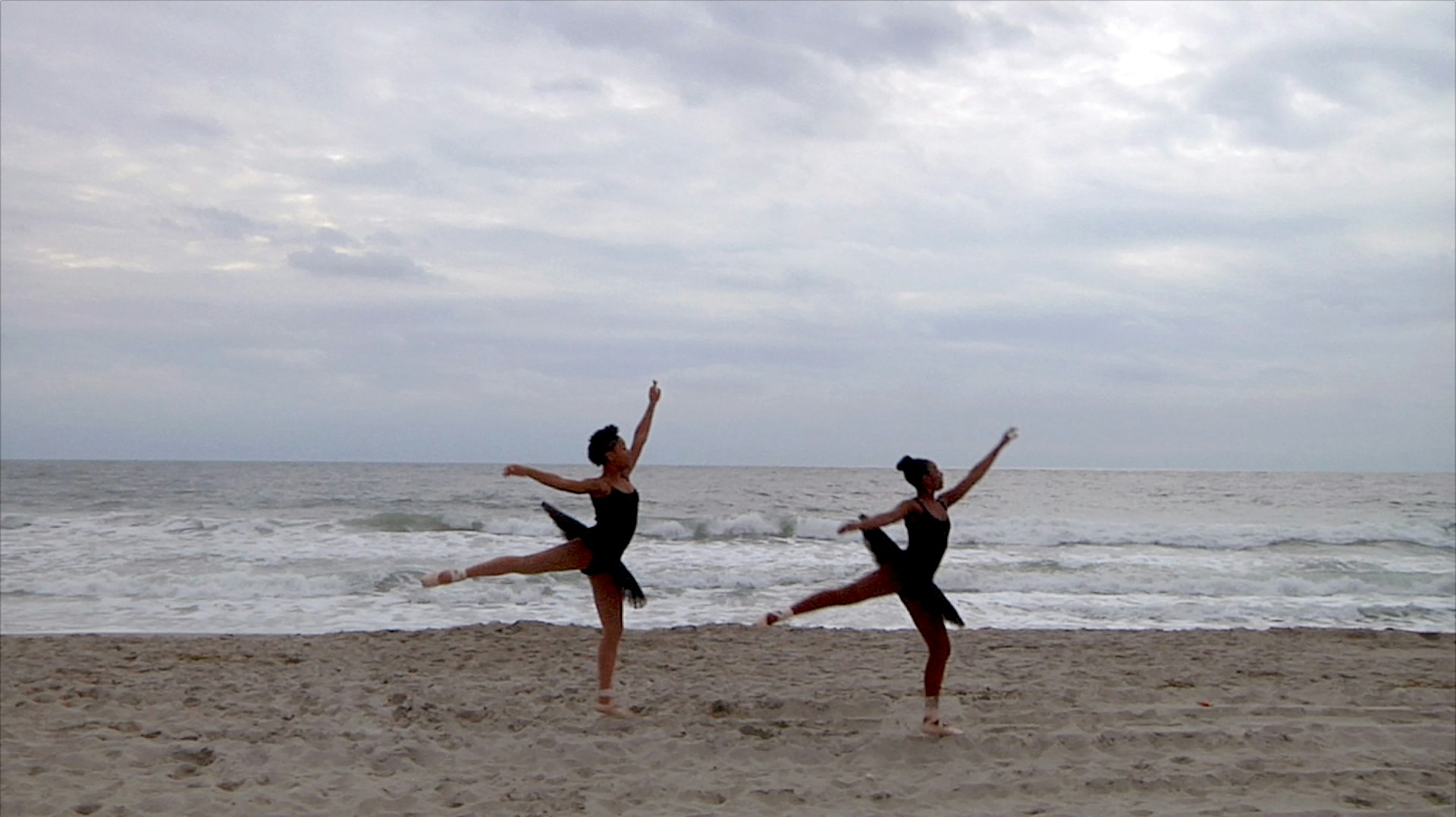 Raven Joseph and Tatianna Burchette, high school students in the Rockaways, dance on the beach hit by Hurricane Sandy 1000 days after the storm.