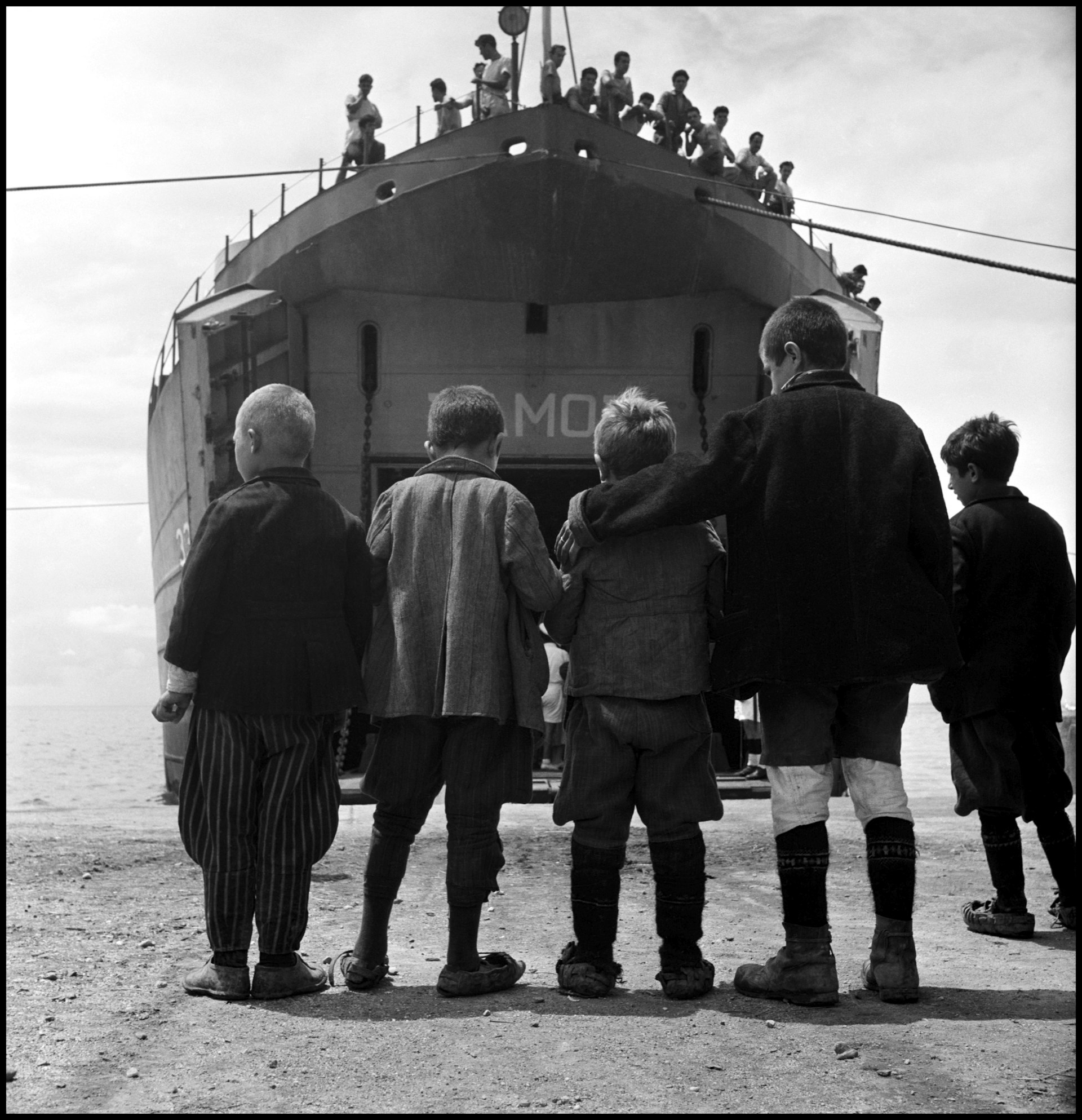  Five boys from Promahi in front if the refugee ship S.S Samos that evacuated children during the Civil War. Greece, 1948 © David Seymour