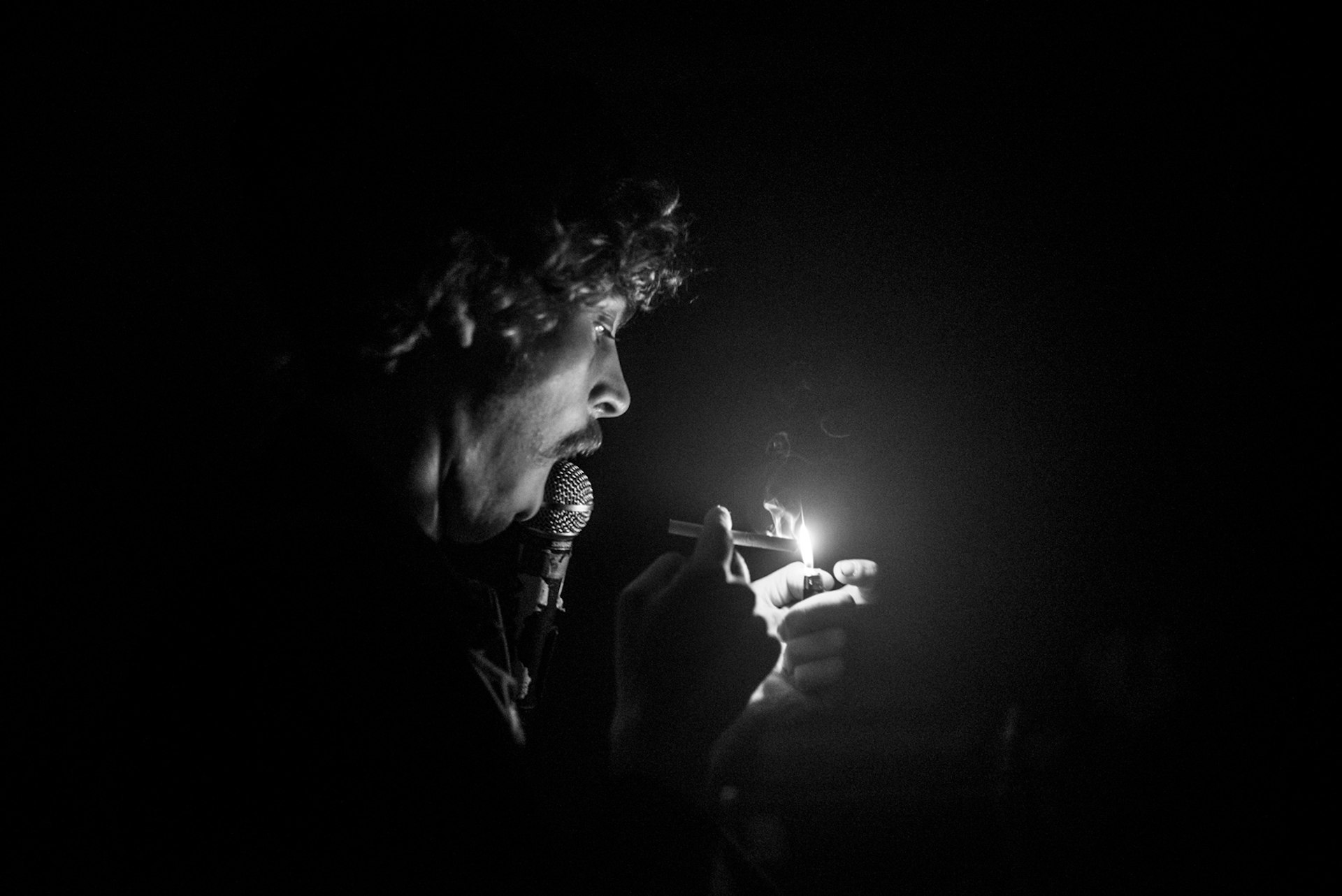 Saul Adamczewski lights a cigarette while performing with members of Paranoid London, Warmduscher and Fat White Family at the Good Room in Brooklyn on Septempber 30, 2015. The largely improvised set was only announced the day before.