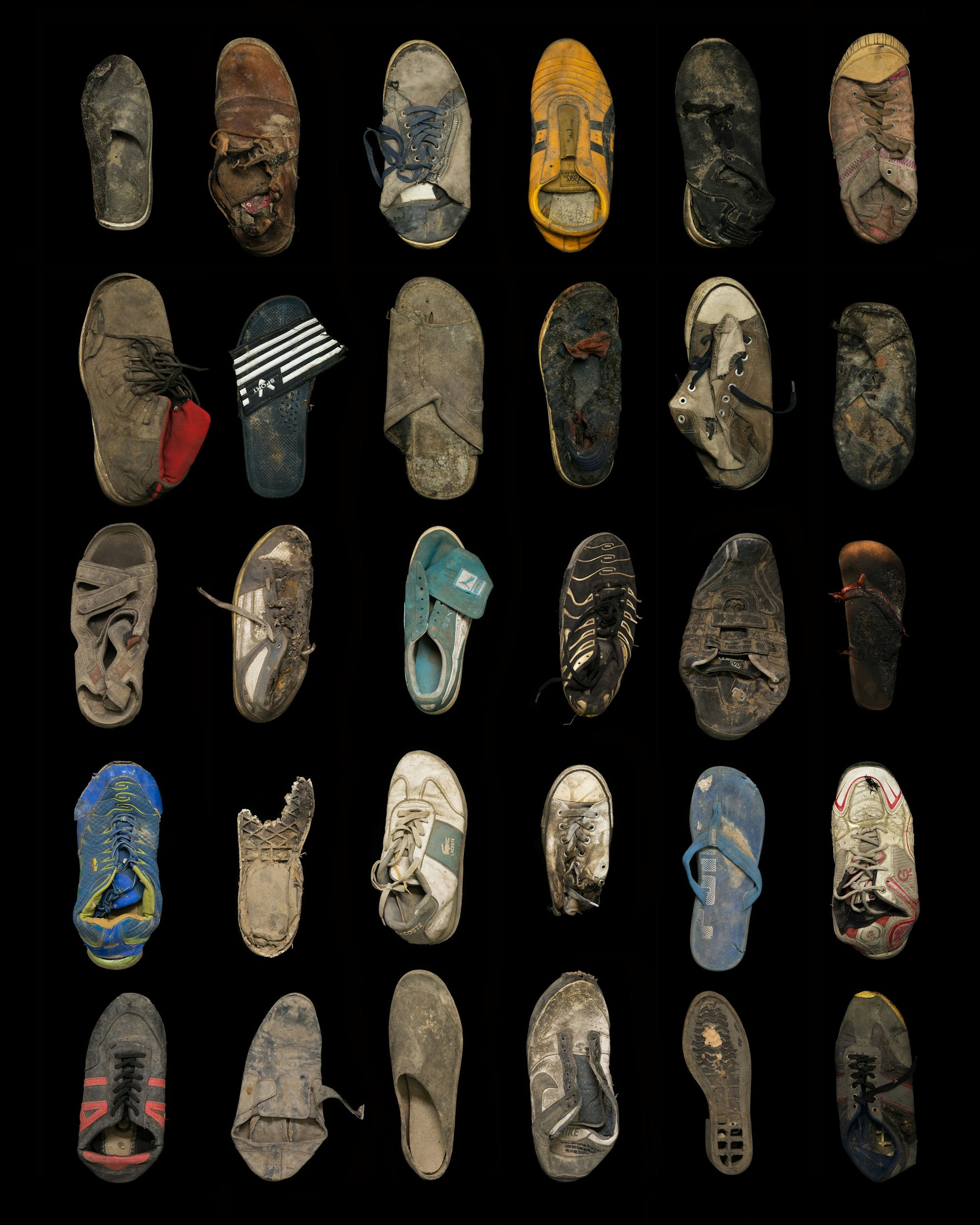Thirty shoes, trainers and sandals Collected 21 May, 15 September, 27 October and 28 October 2016 © Gideon Mendel