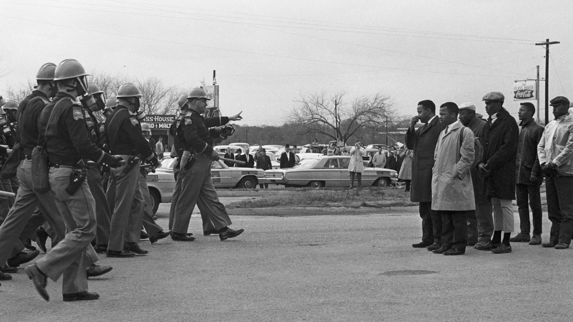 'Two Minute Warning.' Marchers face a line of state troopers in Selma, Alabama moments before police beat the protestors on 7 March, 1965. Photo by Spider Martin, courtesy of Magnolia Pictures.