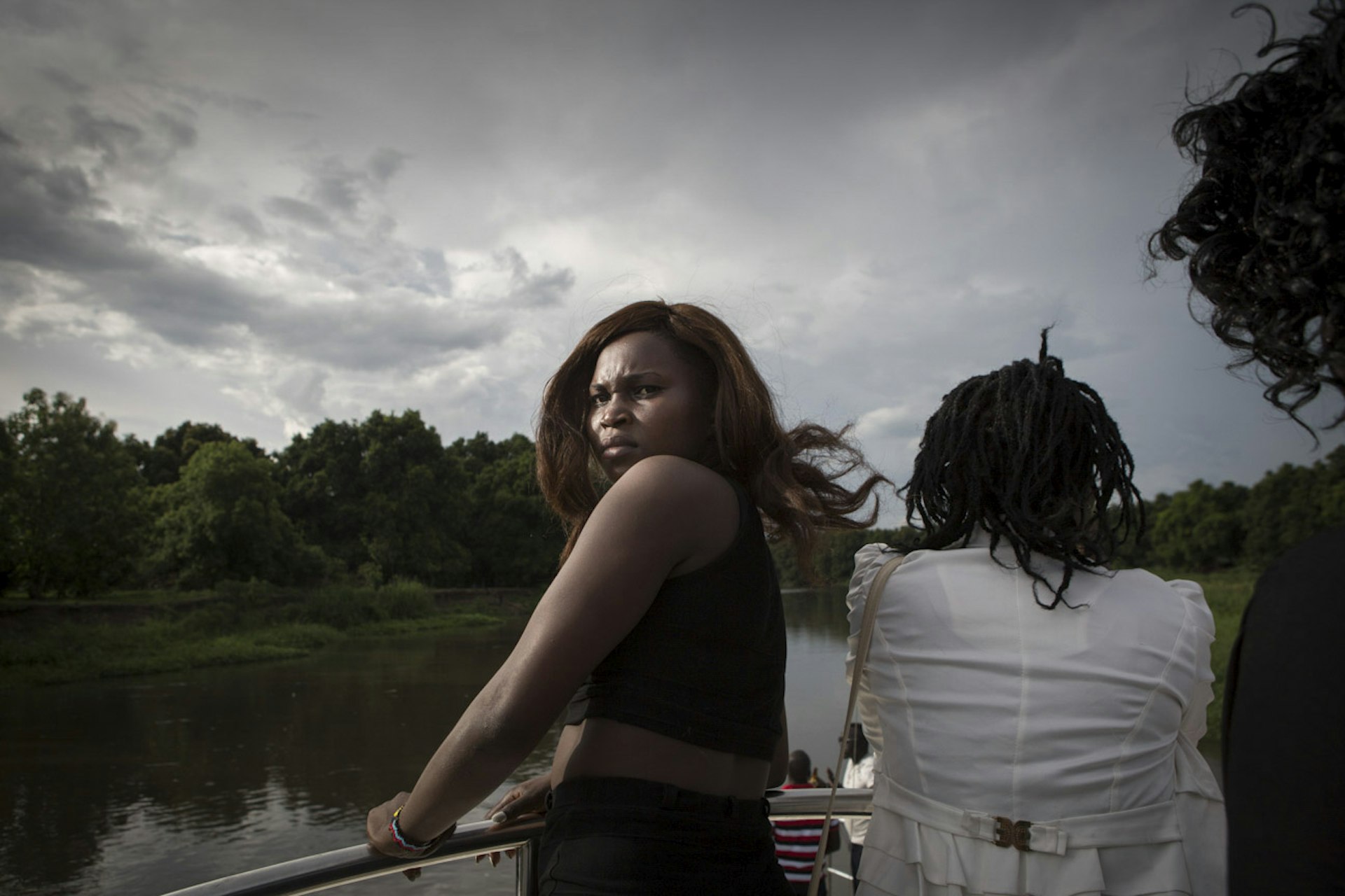 Singer Annet Angaika ('Neetha Baby') on a boat cruising across the White Nile River.