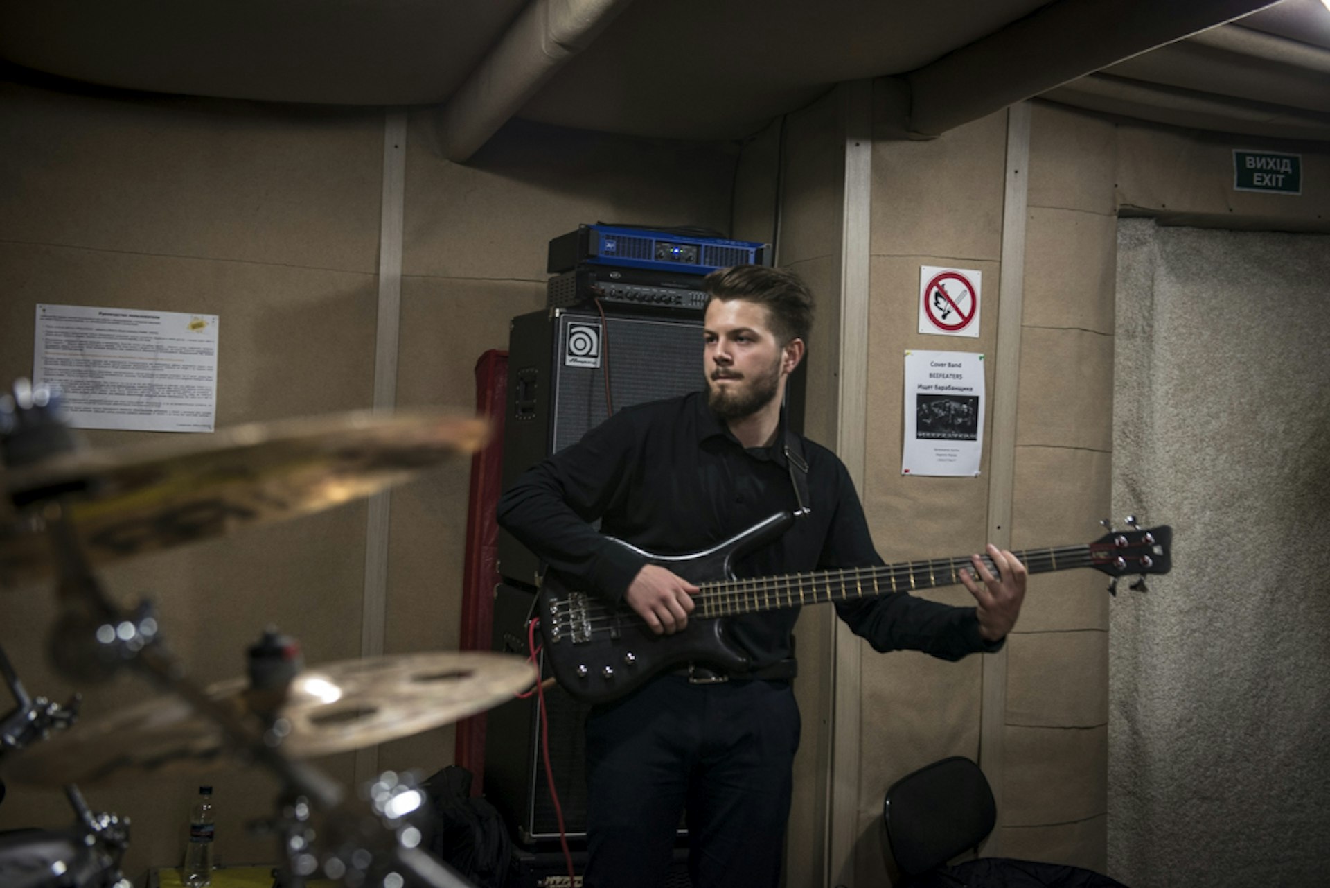 Yevhen Revko, 22 Bassist in Urban FM (center) practices with his band.