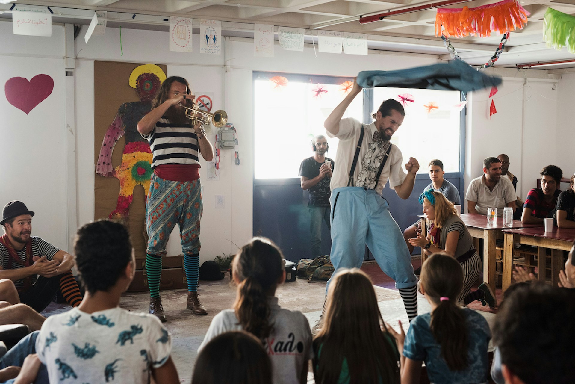 A circus performance by the Flying Seagull Project at Khora, refugee centre in Athens.