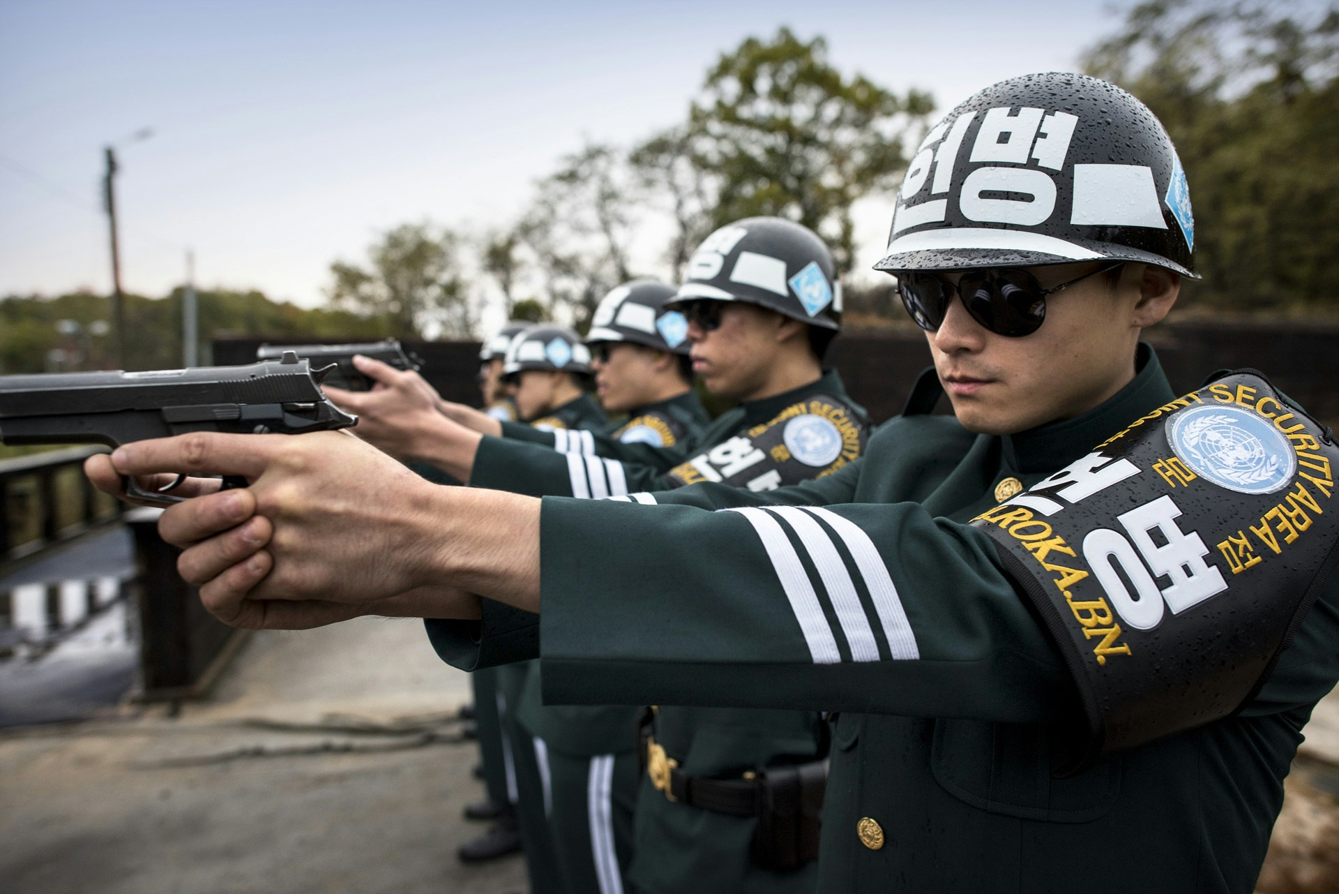 South Korean JSA (Joint Security Area) cordon soldiers practice pistol shooting at the firing range.