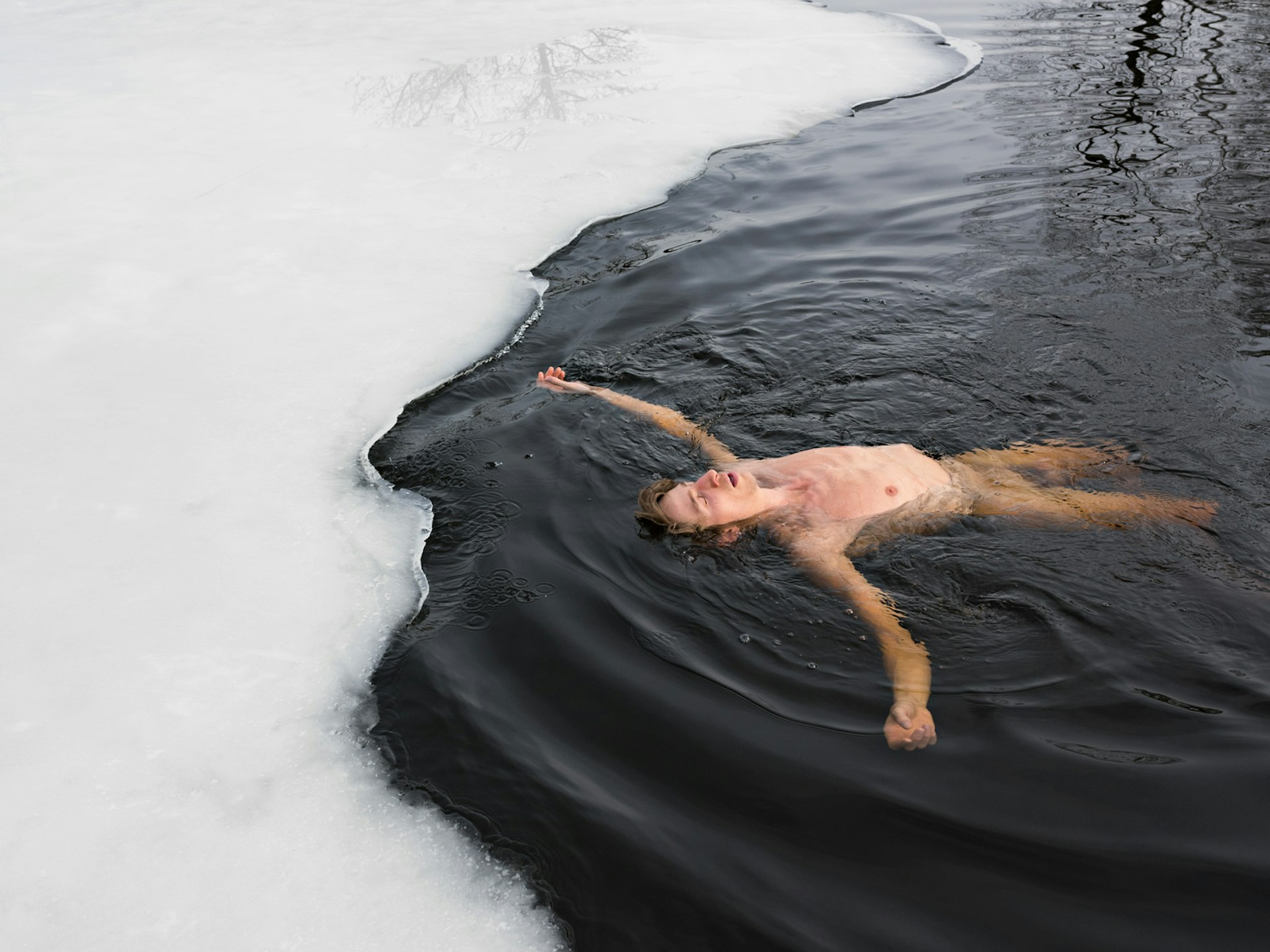 Josh winter bathing, Sweden. © Lucas Foglia, courtesy of Michael Hoppen Gallery, London.