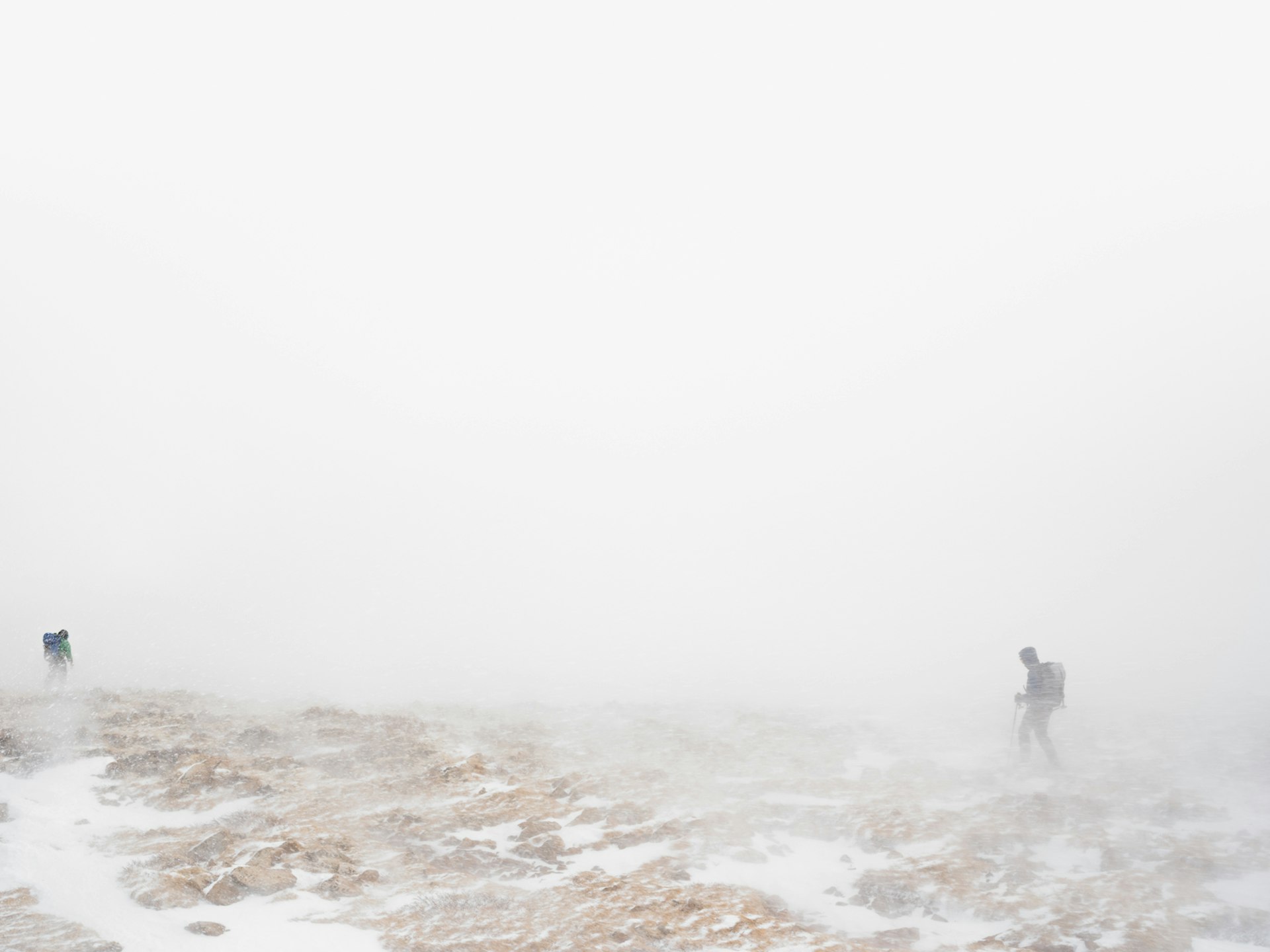 Researchers during a whiteout, Niwot Ridge, Colorado. © Lucas Foglia, courtesy of Michael Hoppen Gallery, London.