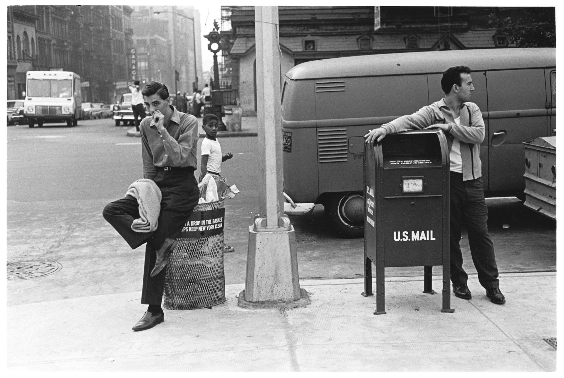 Two young men waiting at the corner, 1965