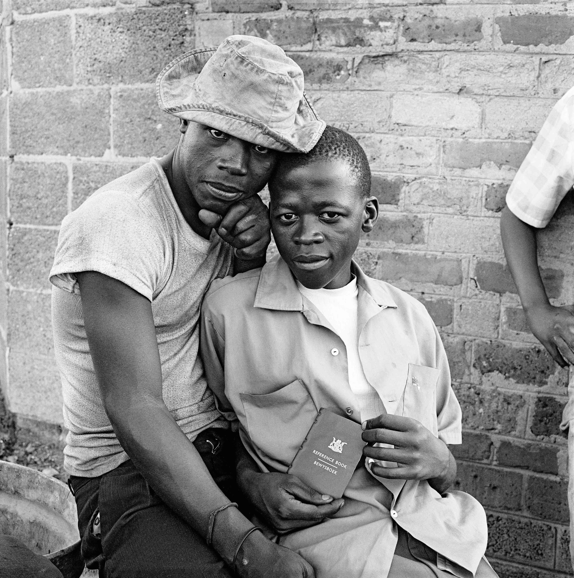 Soweto: Young men with dompas, White City, Jabavu.