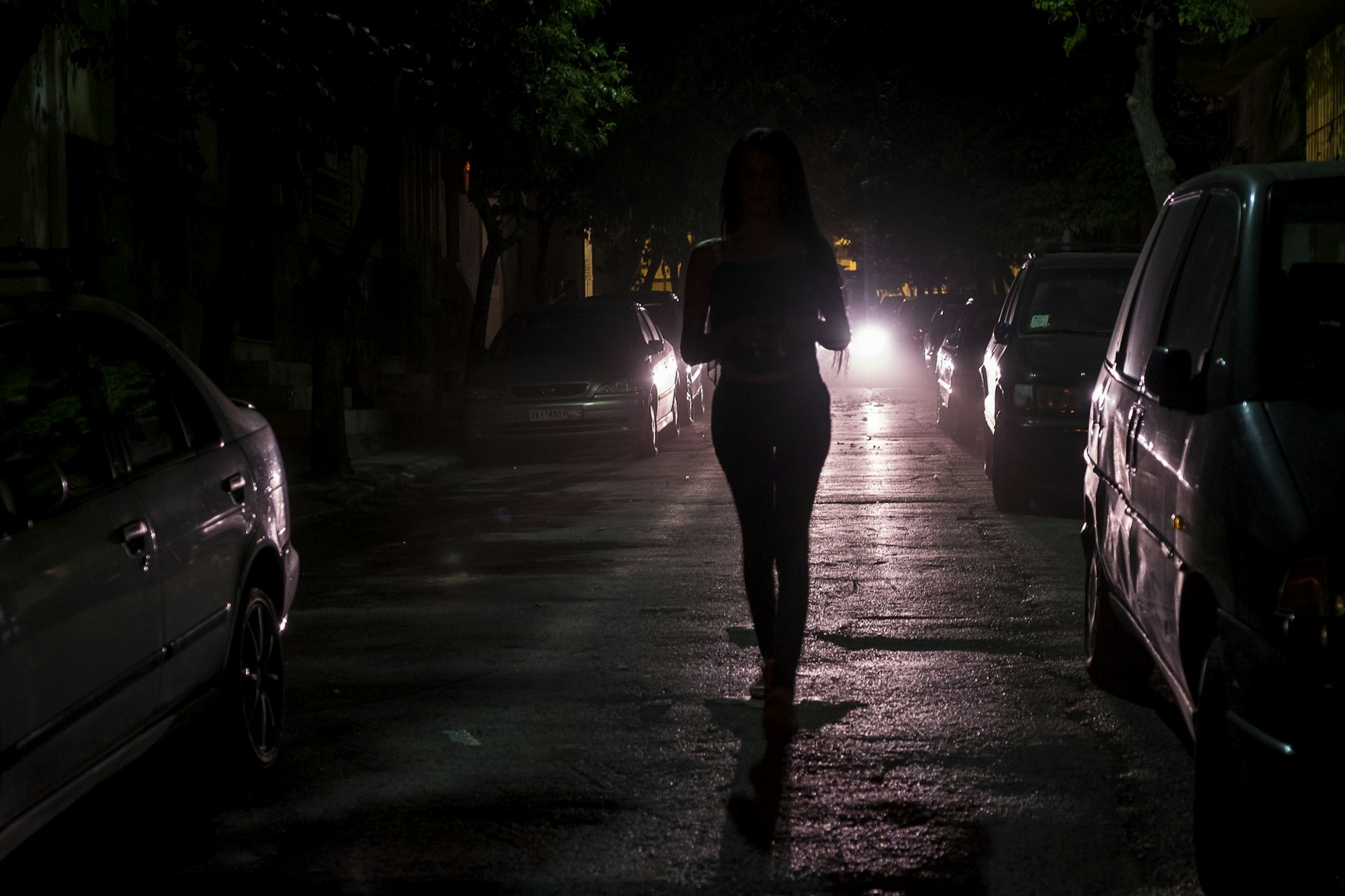 A., 24, a trans woman from the Middle East (who asked not to have her nationality revealed for security reasons), walks down the street on her way to meet some friends at a bar in Athens, Greece. August 6, 2017.