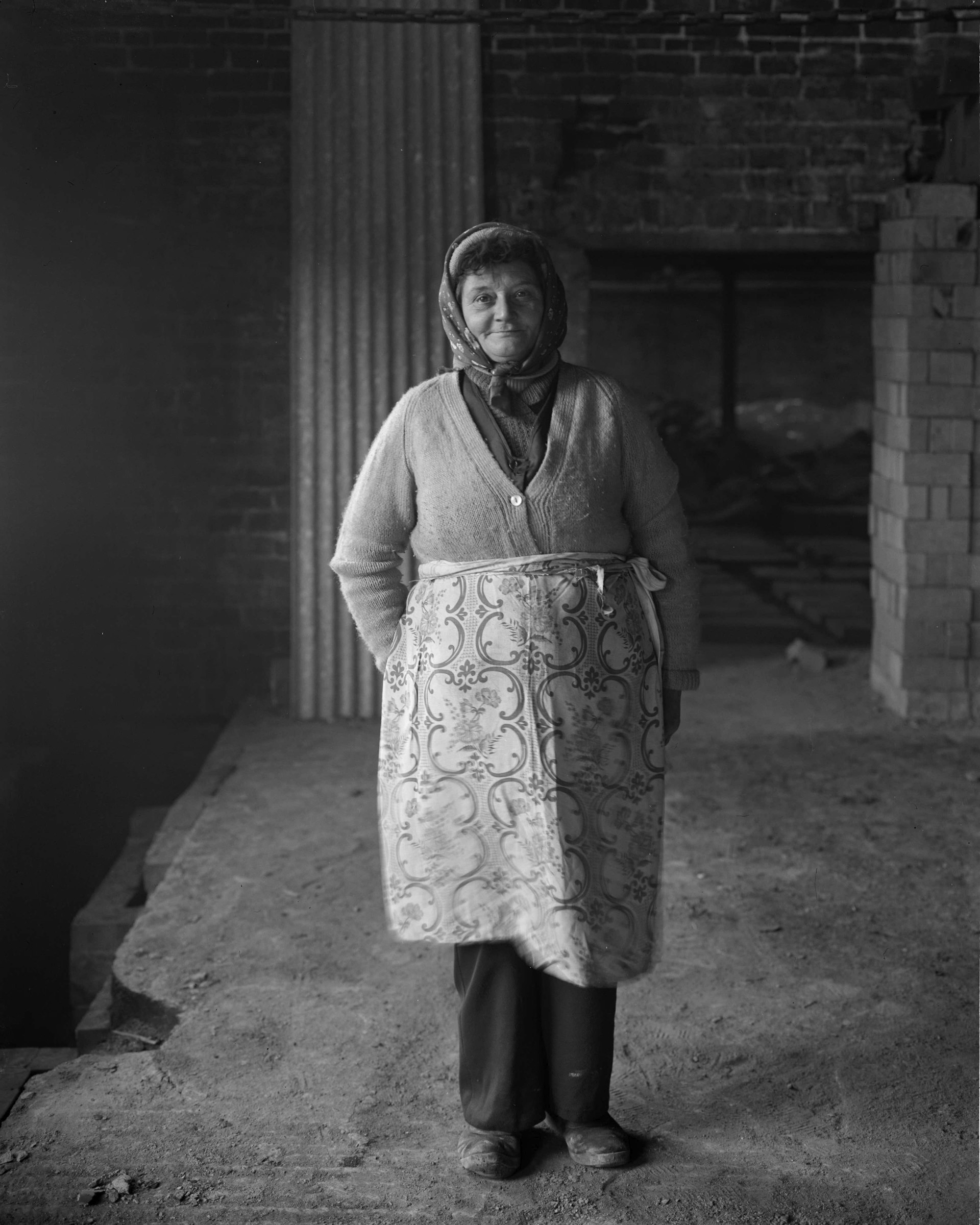 Female brick worker standing, 1983