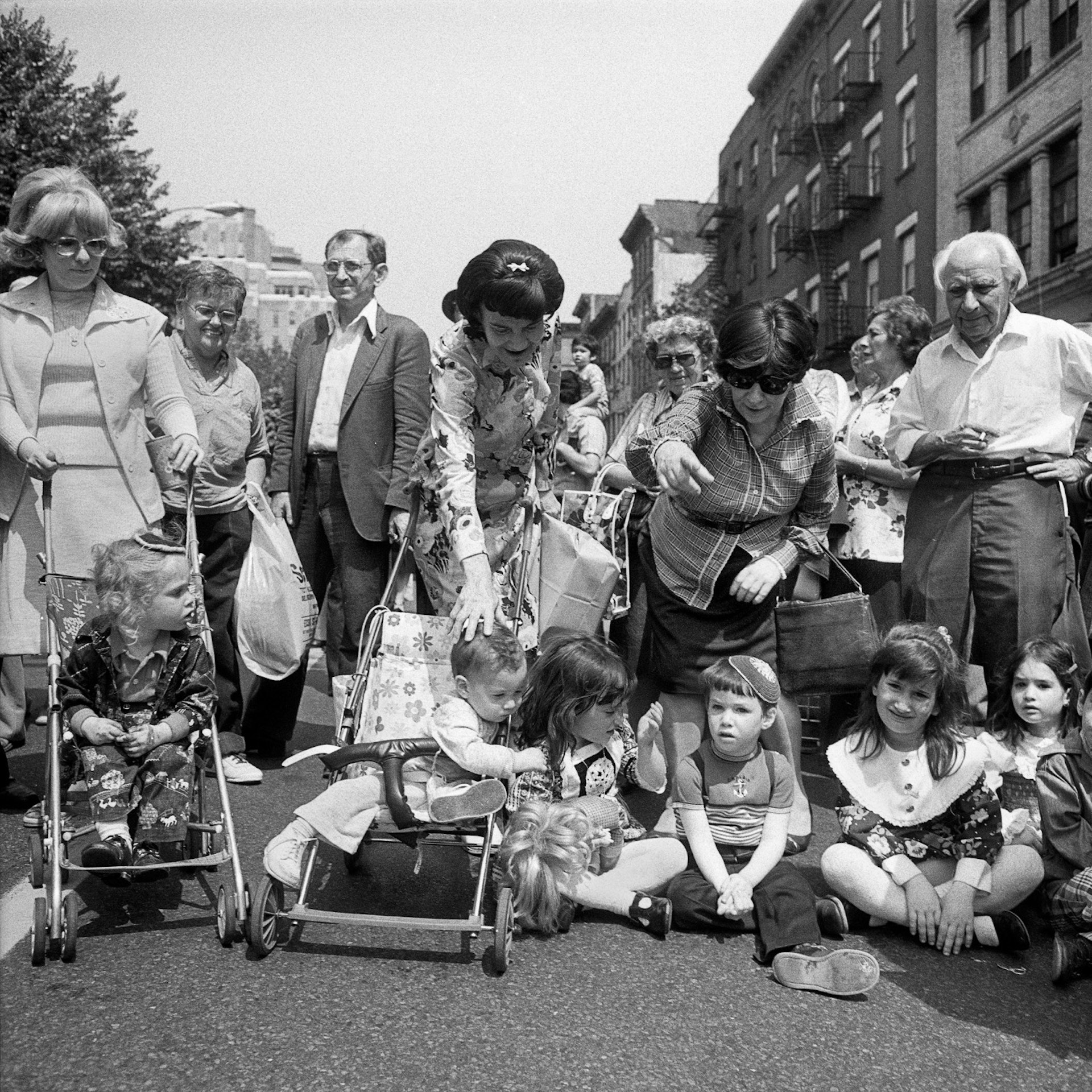 Baby carriages, children and adults at the Lower East Side Street Festival NY, NY June 1978
