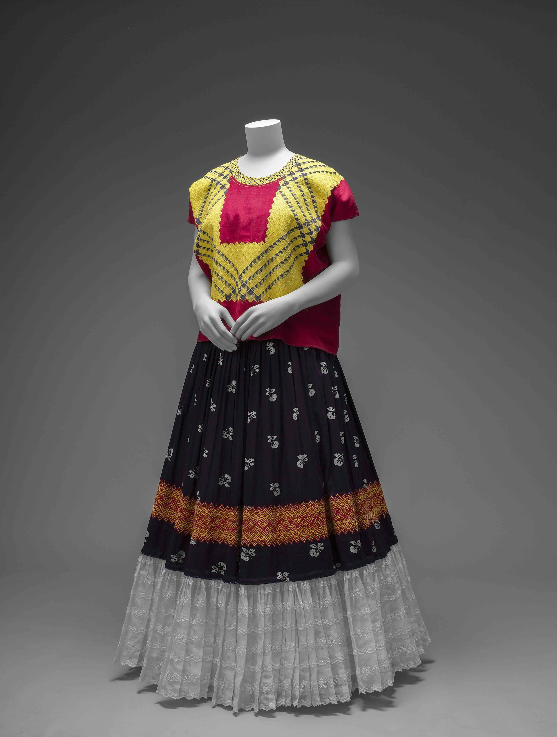 Cotton huipil with machine-embroidered chain stitch; printed cotton skirt with embroidery and holán. Ensemble from the Isthmus of Tehuantepec. Photograph Javier Hinojosa. © Diego Riviera and Frida Kahlo Archives, Banco de México, Fiduciary of the Trust of the Diego Riviera and Frida Kahlo Museums.