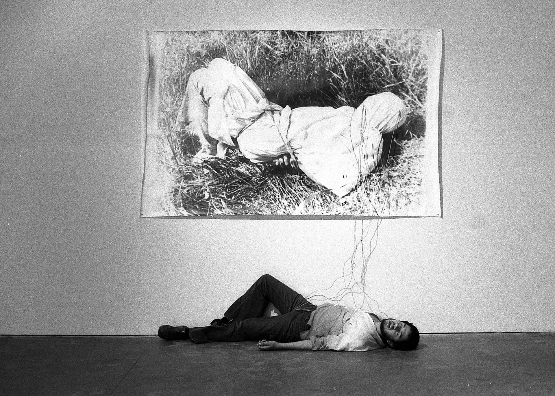 Harry Gamboa Jr., Roberto Gil de Montes, 1978. Gil de Montes shown with his work Tongue Tied in the No Movie exhibition at LACE (Los Angeles Contemporary Exhibitions), May 2–31, 1978. © 1978, Harry Gamboa Jr.