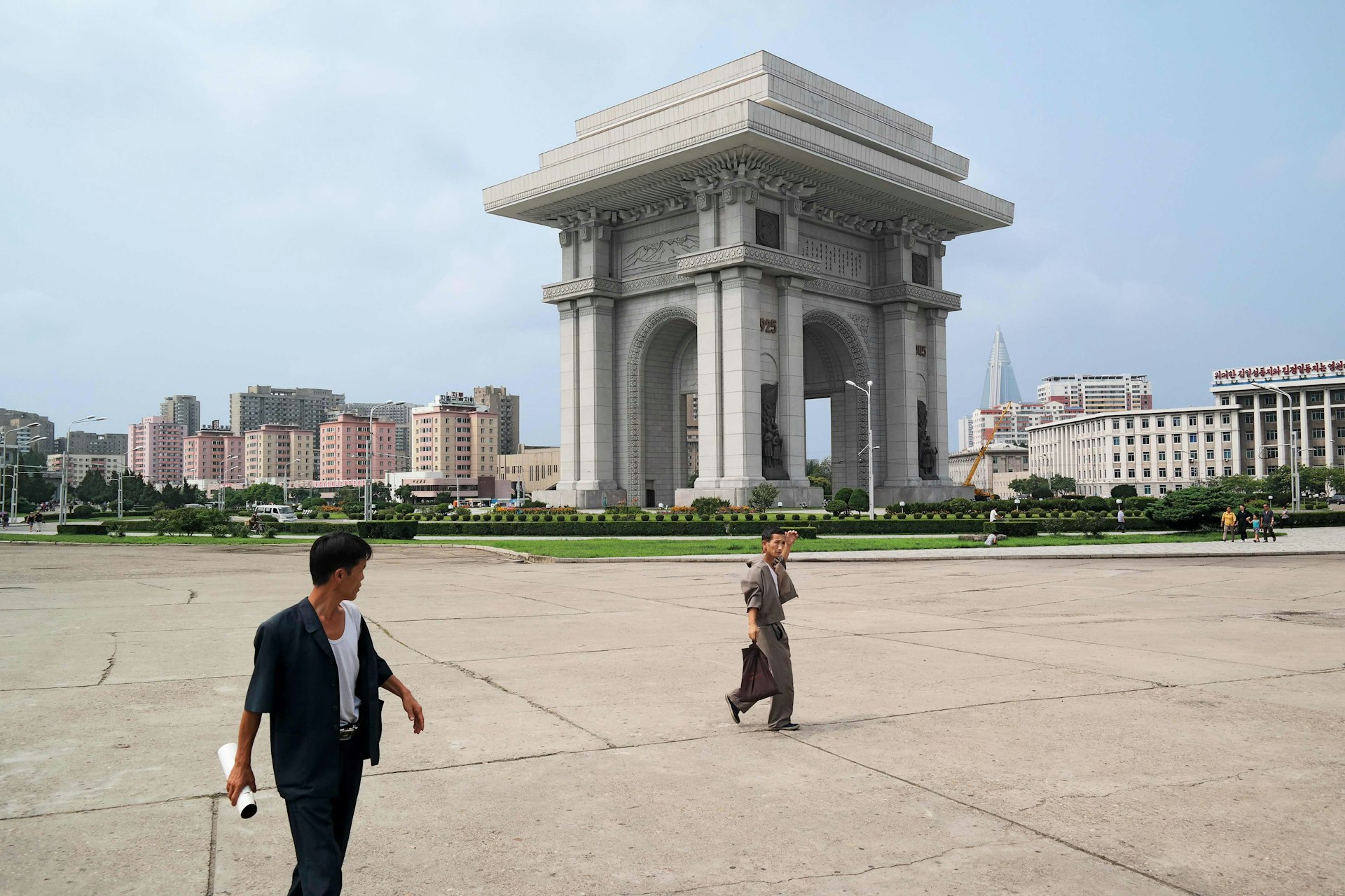 The Arch of Triumph (modelled on the Arc de Triomphe in Paris, but reputedly 10 metres taller because of its great triple-decker stack of rooftops) is built from 25,550 blocks of white granite, representing the number of days of Kim Il Sung’s life on his 70th birthday, when the structure was unveiled in 1982. It was built on the site where Kim Il Sung entered Pyongyang in 1945 to be greeted by cheering Koreans, marking the end of the Japanese occupation and the beginning of socialism.