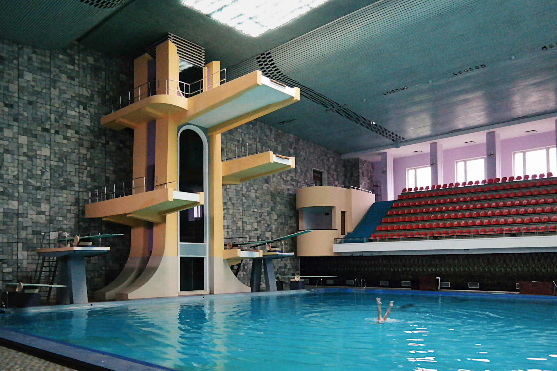 The Changgwang Health and Recreation Complex was the city’s flagship health centre when it opened in 1980. Covering an area of almost 40,000 square metres, it contains a sauna, bathhouse, swimming pools and hair salons – where customers can choose from a range of officially sanctioned haircuts. In a futuristic touch, the diving boards are reached by a mechanical elevator in a shaft faced with smoked glass.