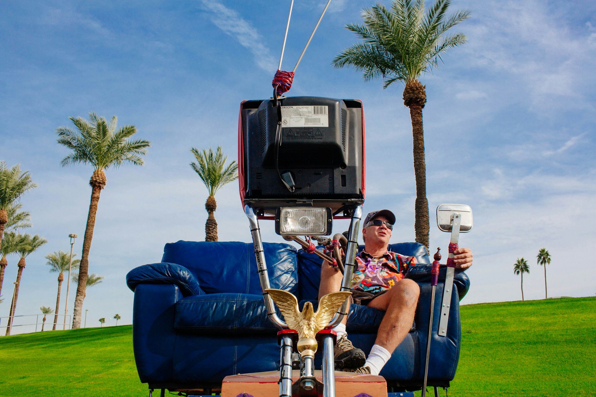 Jerry Zwack, 62, created a motorized couch that he now drives around Sun City because his wife jokingly called him a "couch potato" who needed to get out of the house. He said his odometer now reads more than 3,000 miles. He poses with his one-of-a-kind transportation outside of the Sun Bowl Amphitheater in Sun City, Arizona December 1, 2013.