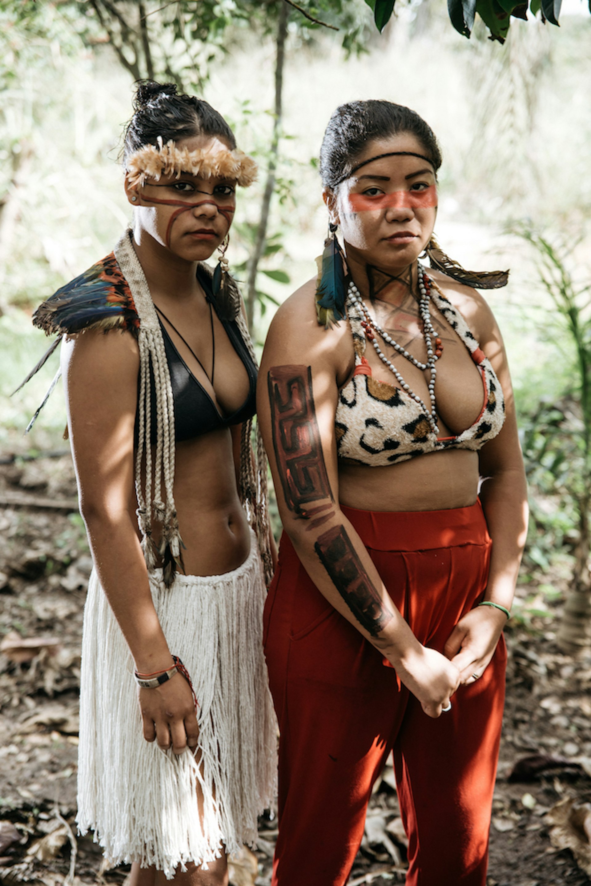 Two indigenous brazilian women in traditional clothing